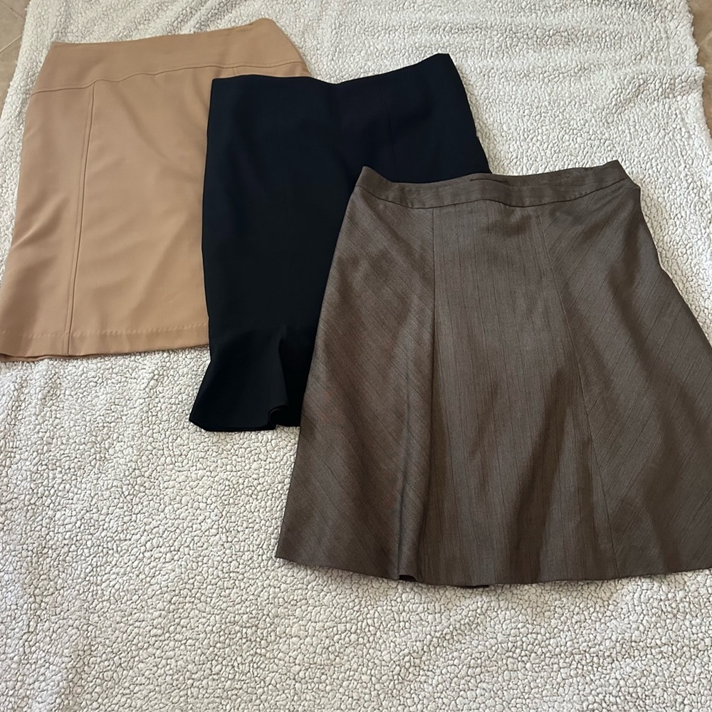 Bundle of 3 skirts. Size 8. EUC. All fully lined. Length between 23.5-25”.